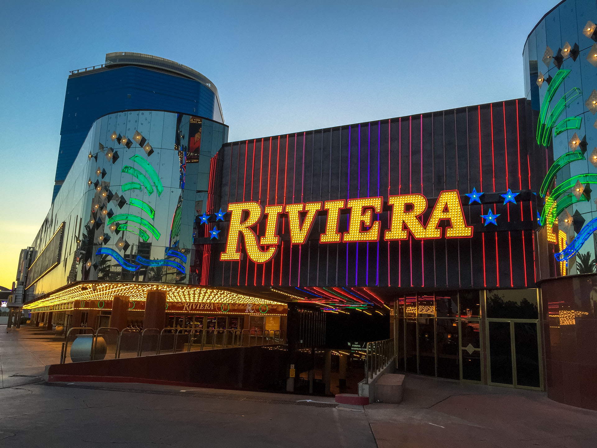 Brightly Colored Promotional Facade Of Riviera Hotel And Casino In